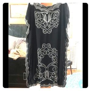 Adorable bathing suit cover up.